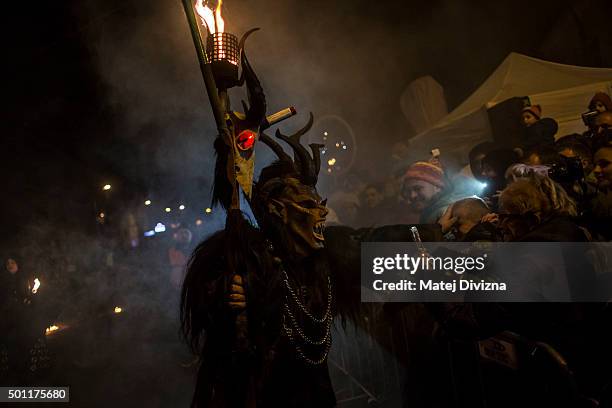 Participant dressed as the Krampus creature approaches onlookers during Krampus gathering on December 12, 2015 in Kaplice, Czech Republic. Krampus,...