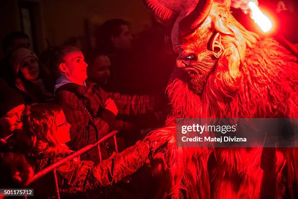 Participant dressed as the Krampus creature approaches onlookers during Krampus gathering on December 12, 2015 in Kaplice, Czech Republic. Krampus,...