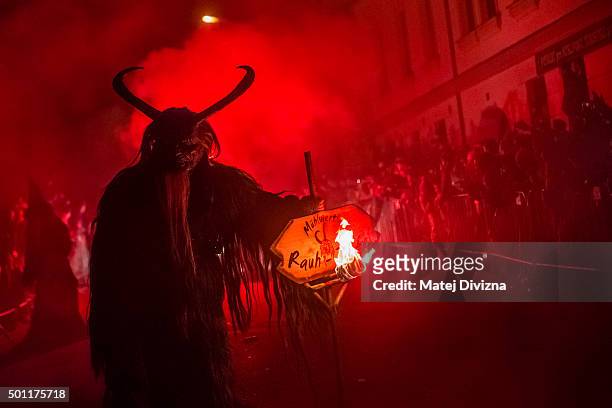 Participant dressed as the Krampus creature walks the streets during Krampus gathering on December 12, 2015 in Kaplice, Czech Republic. Krampus, also...