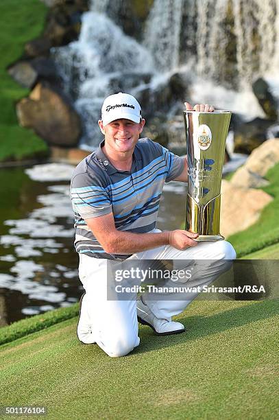 Jamie Donaldson of Wales pose with the trophy after winning the final round of the 2015 Thailand Open at Amata Spring Country Club on December 13,...