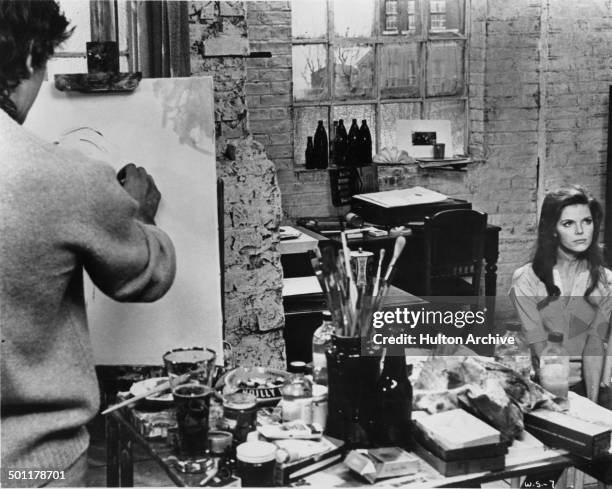 David Hemmings paints a picture of Samantha Eggar in a scene of the movie "The Walking Stick" circa 1970.