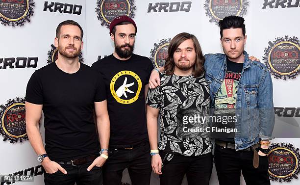 Musicians Will Farquarson, Kyle J Simmons, Chris 'Woody' Wood and Dan Smith of Bastille pose backstage during 106.7 KROQ Almost Acoustic Christmas...