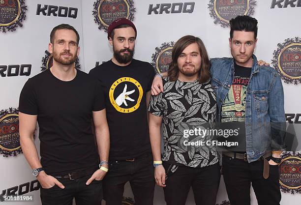 Musicians Will Farquarson, Kyle J Simmons, Chris 'Woody' Wood and Dan Smith of Bastille pose backstage during 106.7 KROQ Almost Acoustic Christmas...