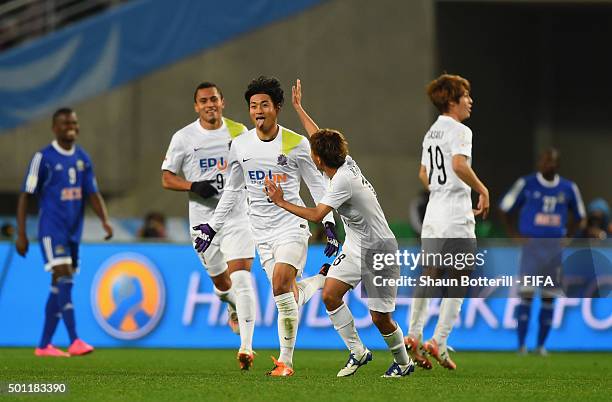 Kazuhiko Chiba of Sanfrecce Hiroshima celebrates after scoring during the the FIFA Club World Cup Quarter Final match between TP Mazembe and...