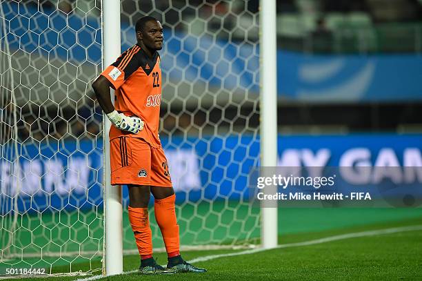 Goalkeeper Sylvain Gbohouo of Mazembe cuts a dejected figure with his team trailing 0-3 during the FIFA Club World Cup Japan 2015 Quarter Final...