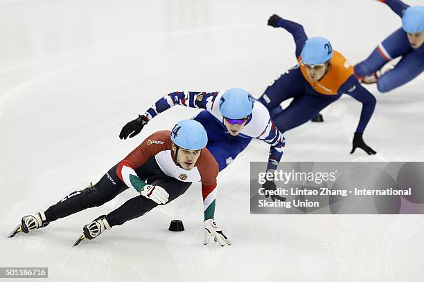 Viktor Knoch of Hungary and Dmitry Migunov of Russia competes in the men's 500m final on day two of the ISU World Cup Short Track speed skating event...