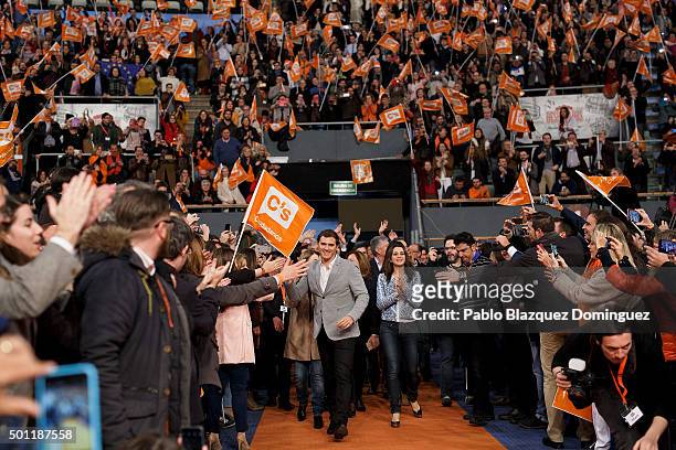 Albert Rivera , leader of Ciudadanos shake hands with supporters as he arrives to a campaign rally at Palacio de Vistalegre on December 13, 2015 in...