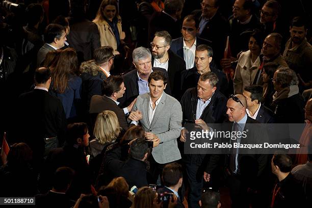 Albert Rivera , leader of Ciudadanos shake hands with supporters as he leaves a campaign rally at Palacio de Vistalegre on December 13, 2015 in...