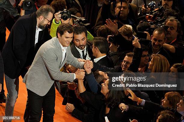 Albert Rivera , leader of Ciudadanos shake hands with supporters as he leaves a campaign rally at Palacio de Vistalegre on December 13, 2015 in...