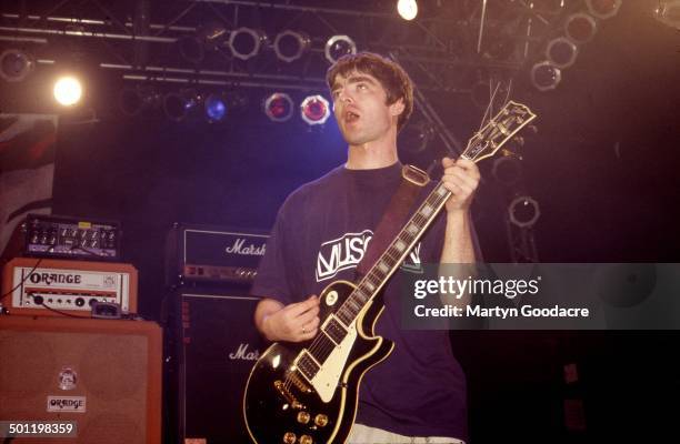 Noel Gallagher of Oasis performs on stage, United States, 1994.