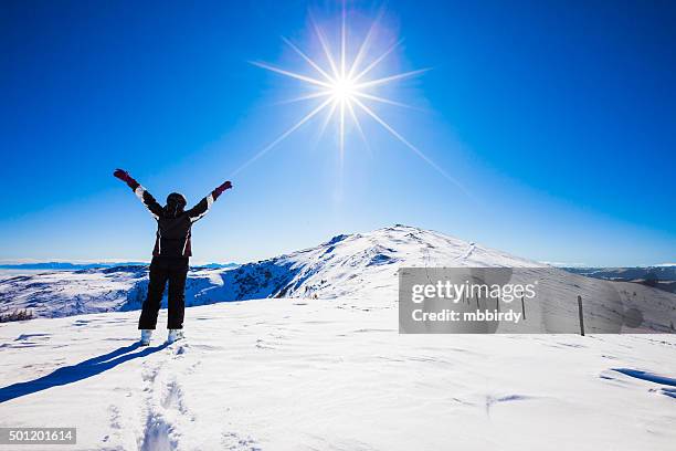 happy woman skier on top of ski resort - bad kleinkirchheim stock pictures, royalty-free photos & images