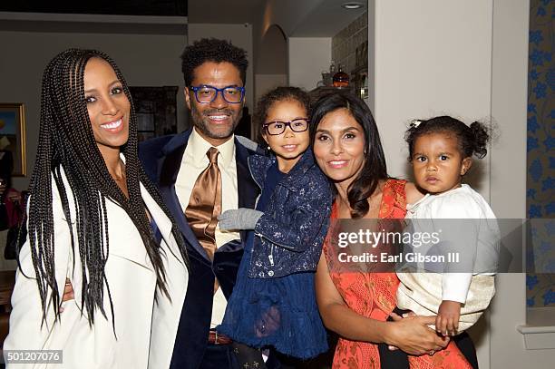 Personality Shaun Robinson, Singer/Songwriter Eric Benet, daughter Lucia Bella, humanitarian/wife Manuela Testolini and daughter Amoura Luna attend...