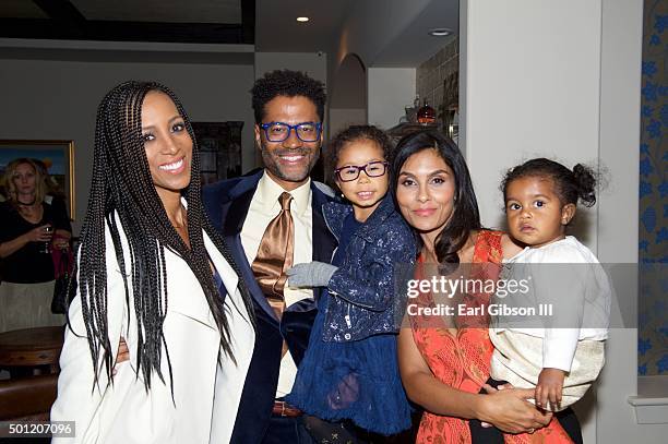 Personality Shaun Robinson, Singer/Songwriter Eric Benet, daughter Lucia Bella, humanitarian/wife Manuela Testolini and daughter Amoura Luna attend...