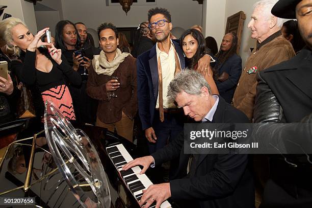 Singer/Songwriter Eric Benet and Musician David Foster have an impromptu performance at the In A Perfect World 10 Year Celebration on December 12,...