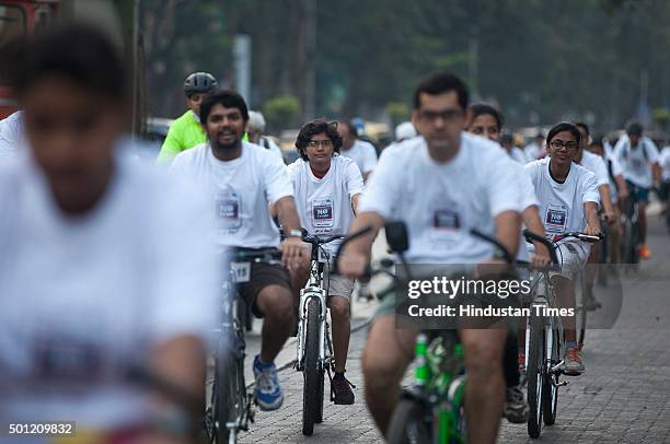 Mumbaikars participate in a cyclothon from Bandra to Goregoan during a "No TV Day" weekend fest organized by Hindustan Times, on December 12, 2015 in...