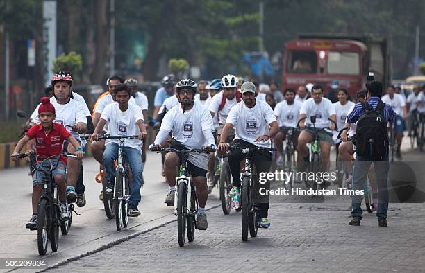 Mumbaikars participate in a cyclothon from Bandra to Goregoan during a "No TV Day" weekend fest organized by Hindustan Times, on December 12, 2015 in...