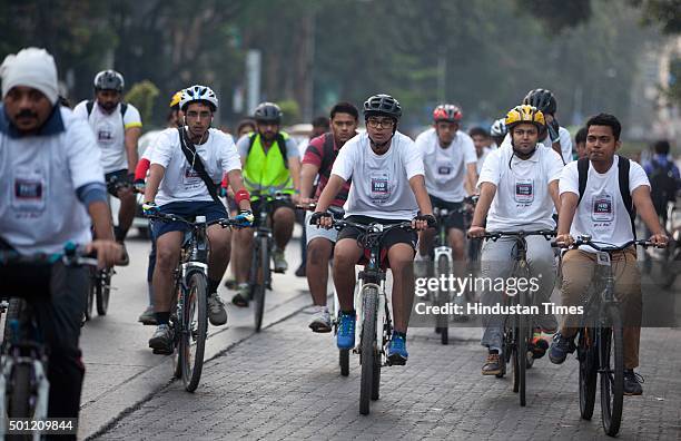 Mumbaikars participate in a cyclothon from Bandra to Goregoan during a "No TV Day" weekend fest organized by Hindustan Times, on December 12, 2015 in...