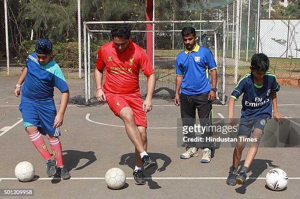 People participate in football training program at Wadala during a "No TV Day" weekend fest organized by Hindustan Times, on December 12, 2015 in...