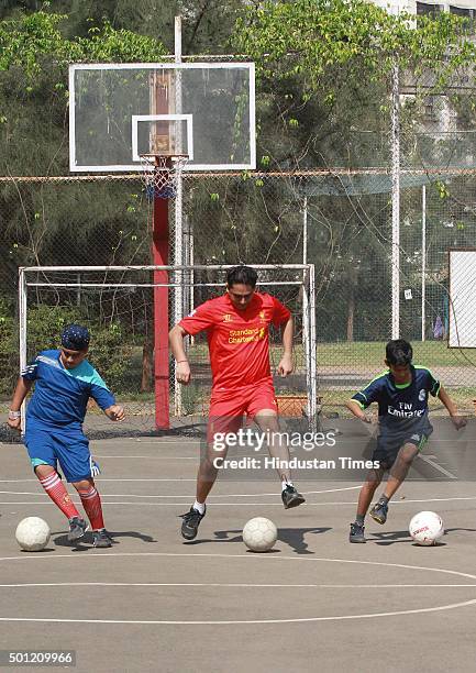 People participate in football training program at Wadala during a "No TV Day" weekend fest organized by Hindustan Times, on December 12, 2015 in...