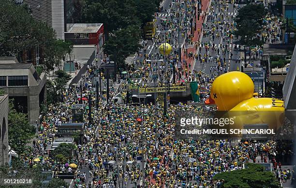 Demonstrators rally in support of Brazilian President Dilma Rousseff's impeachment at Paulista Avenue, in Sao Paulo, Brazil on December 13, 2015....