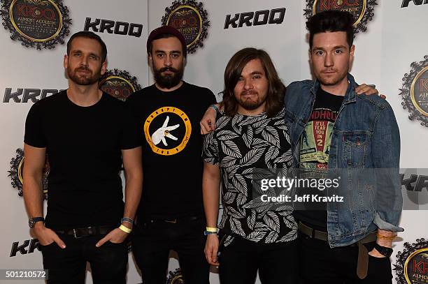 Musicians Will Farquarson, Kyle J Simmons, Chris 'Woody' Wood and Dan Smith of Bastille attend 106.7 KROQ Almost Acoustic Christmas 2015 at The Forum...