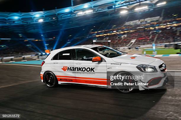 Jean Alesi with the Mercedes AMG A45 racing at Mercedes-Benz Arena on December 12, 2015 in Stuttgart, Germany. Jean Alesi