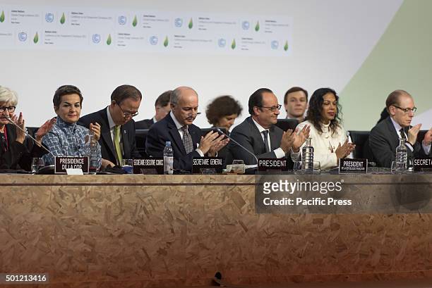 Foreign Affairs Minister and President-designate of COP21 Laurent Fabius , applause with Secretary General of the United Nations Ban Ki Moon and...