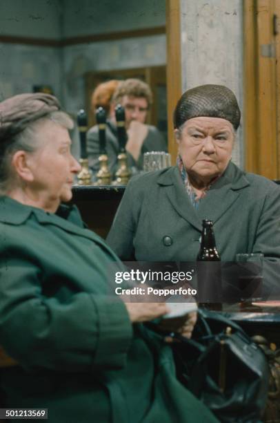 From left to right - English actresses Margot Bryant as 'Minnie Caldwell' and Violet Carson as 'Ena Sharples' pictured together in a Rovers Return...