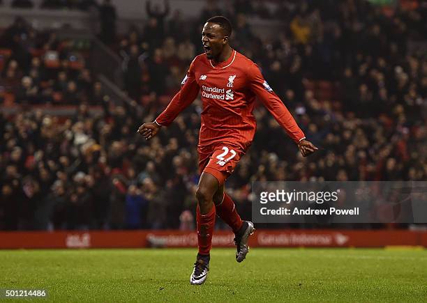 Divock Origi of Liverpool celebrates scoring the equalising goal during the Barclays Premier League match between Liverpool and West Bromwich Albion...