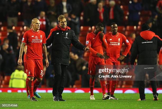 Jurgen Klopp, manager of Liverpool and Martin Skrtel of Liverpool in discussion after the Barclays Premier League match between Liverpool and West...