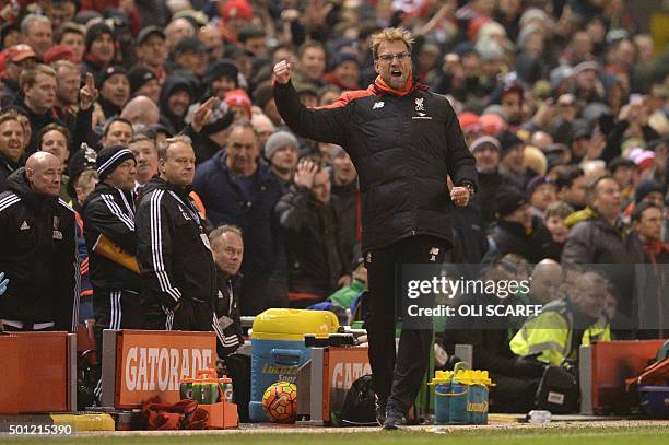 Liverpool's German manager Jurgen Klopp celebrates their late equalising goal to level the score at 2-2 the English Premier League football match...