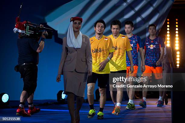 Mohammad Ahsan and Hendra Setiawan of Indonesia arrives to the award ceremony ahead of Chai Biao and Hong Wei of China after winning against them the...