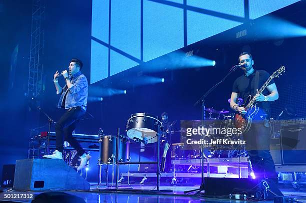 Musicians Dan Smith, Chris 'Woody' Wood and Will Farquarson of Bastille perform onstage during 106.7 KROQ Almost Acoustic Christmas 2015 at The Forum...