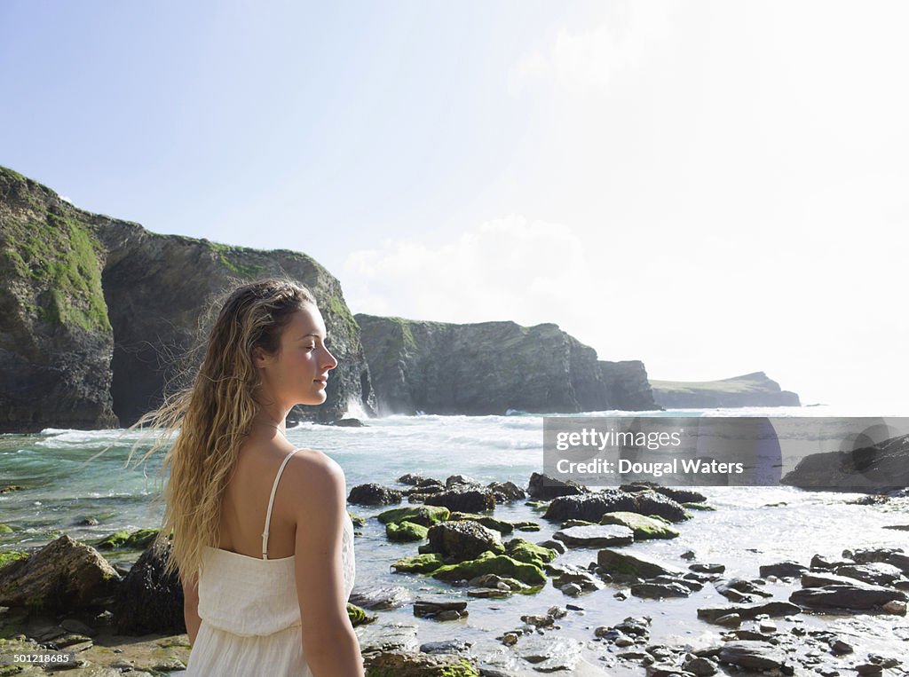 Profile of woman with eyes closed at beach