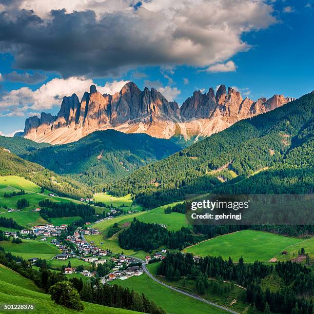 italian alps in funes walley, dolomites - town square stockfoto's en -beelden