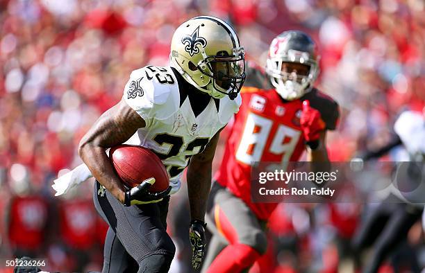 Marcus Murphy of the New Orleans Saints carries during the first half of the game against the Tampa Bay Buccaneers at Raymond James Stadium on...