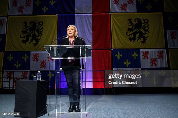 French far-right Front National party's President Marine Le Pen candidate for the regional election in the Nord-Pas-de-Calais-Picardie region makes a...