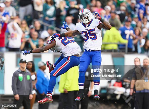 Mike Gillislee of the Buffalo Bills celebrates his touchdown with teammate LeSean McCoy against the Philadelphia Eagles in the third quarter at...