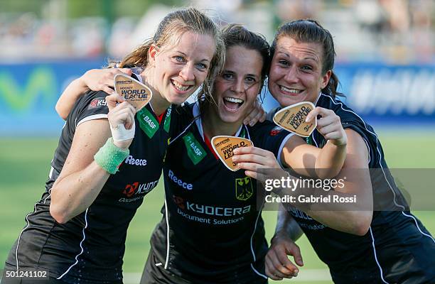 Julia Muller, Pia-Sophie Oldhafer pose for a photo with their bronce medals after winning a bronze medal match between China and Germany as part of...