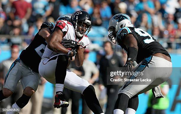 Roddy White of the Atlanta Falcons makes a catch against the Carolina Panthers in the 1st half during their game at Bank of America Stadium on...