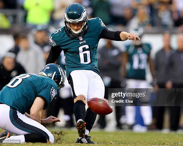 Caleb Sturgis of the Philadelphia Eagles kicks the game winning field goal as Donnie Jones holds in the fourth quarter against the Buffalo Bills at...