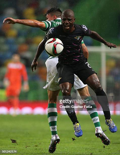 Moreirense FC's midfielder Vitor Gomes with Sporting CP's defender Jonathan Silva in action during the Primeira Liga match between Sporting CP and...