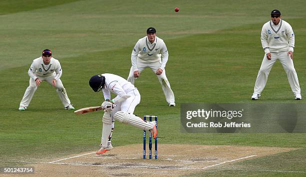 Dinesh Chandimal of Sri Lanka ducks under a bouncer during day five of the First Test match between New Zealand and Sri Lanka at University Oval on...