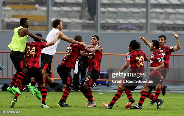 Minzum Quina of FBC Melgar celebrates with his teammates the second goal of his team against Sporting Cristal during a first leg final match between...