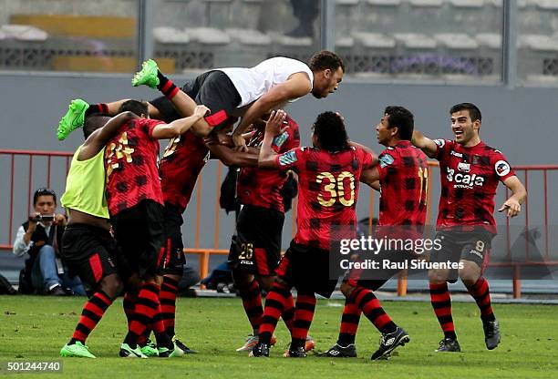 Minzum Quina of FBC Melgar celebrates with his teammates the second goal of his team against Sporting Cristal during a first leg final match between...