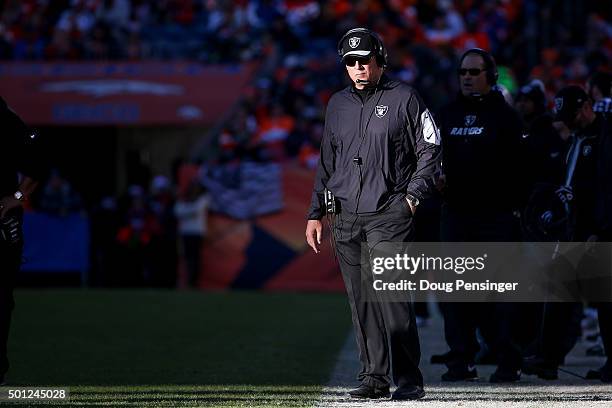 Head coach Jack Del Rio of the Oakland Raiders looks on from the sideline during a game against the Denver Broncos at Sports Authority Field at Mile...