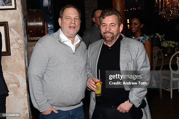 Harvey Weinstein and James Dolan attend a celebration for Bryan Cranston at House of Elyx on December 13, 2015 in New York City.