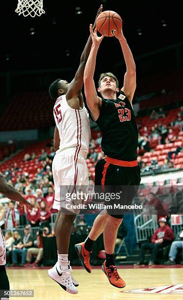 Hooper Vint of the UTEP Miners attempts to score a goal against Junior Longrus of the Washington State Cougars during the second half of the game at...