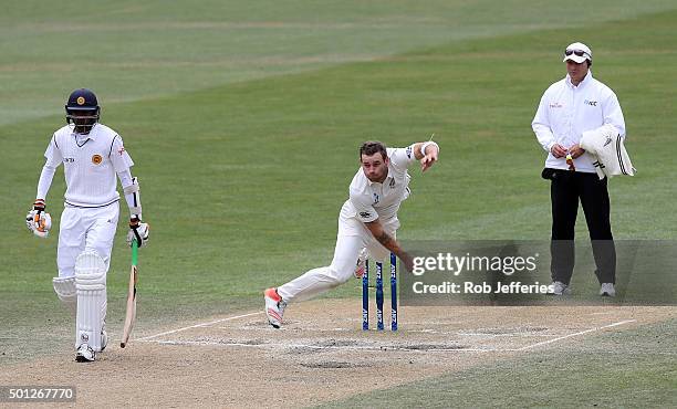 Doug Bracewell of New Zealand bowls during day five of the First Test match between New Zealand and Sri Lanka at University Oval on December 14, 2015...