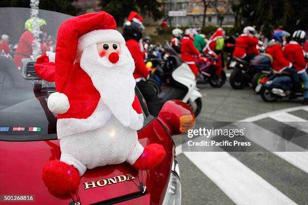 Thousands of people dressed as Santa Claus took part in the sixth edition of "Un Babbo Natale in Moto". In photo a peluches of Santa Claus.